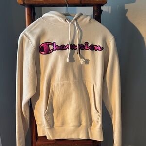 Champion Off-White Hoodie with Vibrant Pink Logo